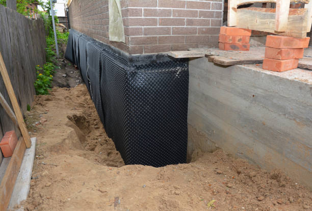 SJ Waterproofing Pros technician performing targeted Emergency Waterproofing assessment in Carol Stream, IL